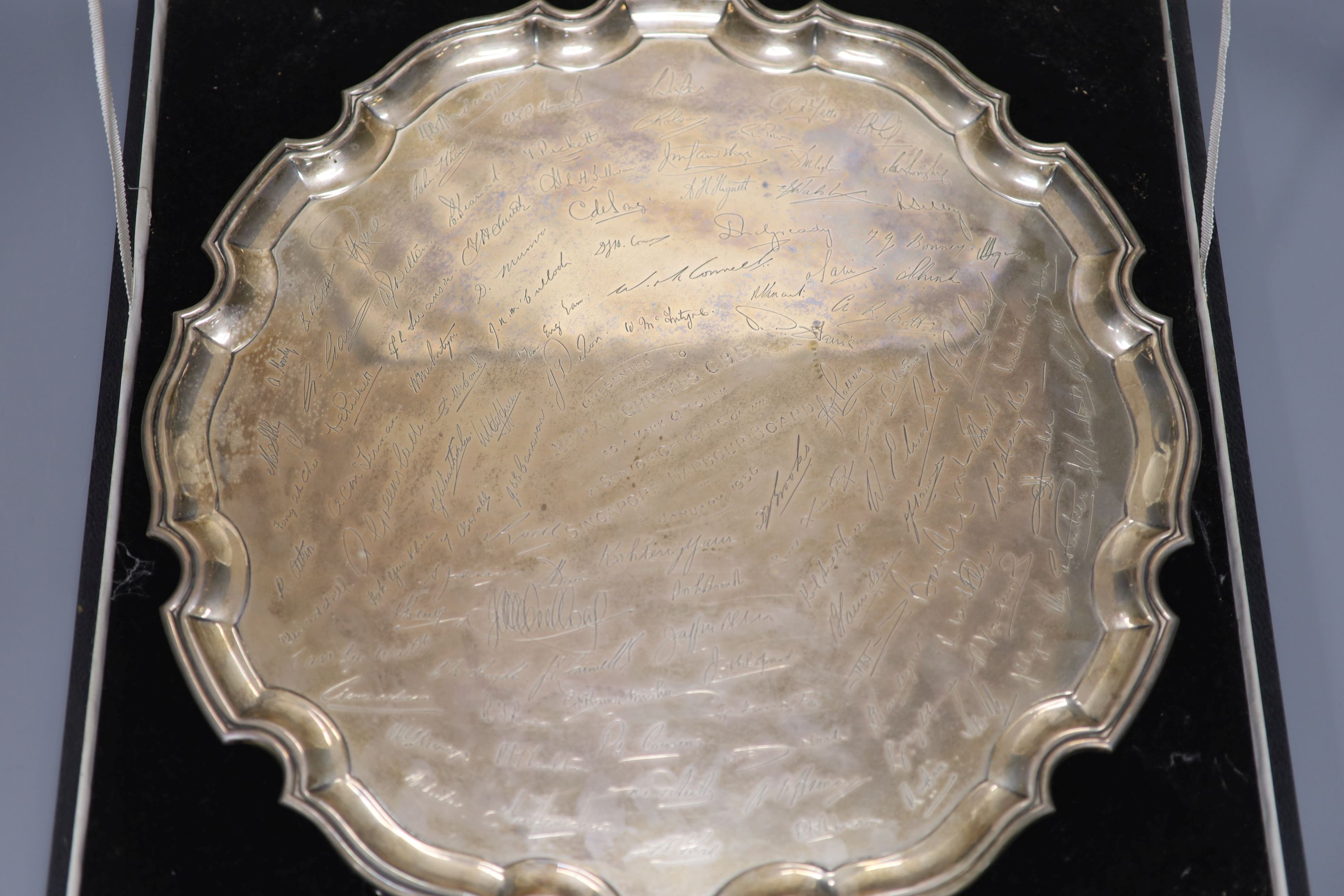 A large silver presentation salver with piecrust edge, 57.5oz
